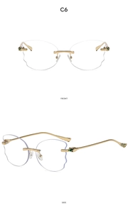 Macro detail of rimless scalloped sunglasses with gold metal snake head temple decor