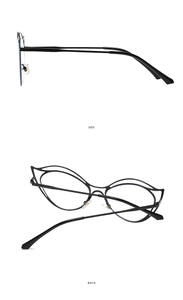 Detail view of irregular black cat-eye glasses with side and back cutout hollow frame
