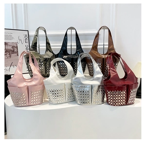 Collection of rivet studded PU leather shoulder bags in various colors on display
