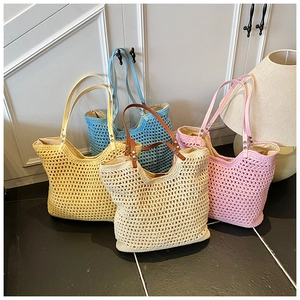 Detailed view of colorful hollow crochet tote bags in beige, yellow, blue, and pink colors