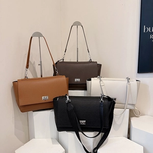 Chic solid color leather crossbody bag for women with silver metal twist lock closure