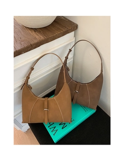 Detail view of retro hobo bags with white contrast stitching and buckle design
