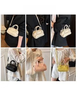 Litchi texture mini Boston bags shown in four colors with various carrying styles