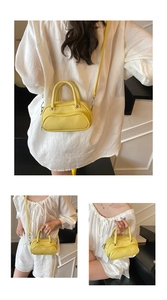 Detailed views of yellow lychee texture crossbody bag with shoulder strap and top handle