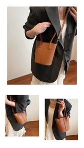 Detailed view of brown litchi pattern leather bucket bag with top handle and strap