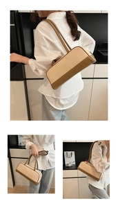 Detail of two-tone canvas and brown leather shoulder bag shown on model in home setting