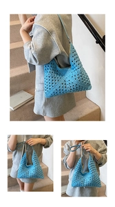 Detail of light blue crochet shoulder bag featuring hollow granny square woven patterns