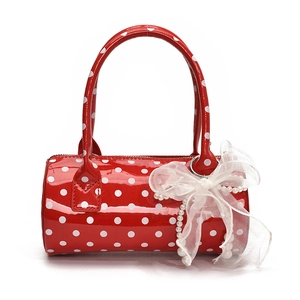 Red polka dot cylindrical handbag with white mesh bow and pearl charms for women