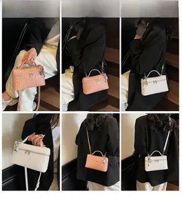 Ostrich pattern mini square bags shown in multiple carrying styles on a model