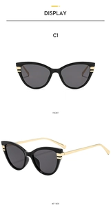Detailed front and 45-degree side views of black cat-eye sunglasses with gold metal temples