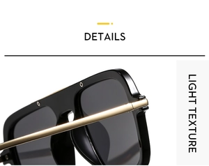 Detail of square pilot sunglasses featuring black frame and gold metal accent bar