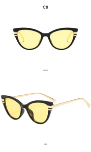 Front and side view of black cat-eye sunglasses with yellow lenses and gold metal temples