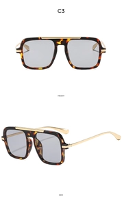 Detail view of square pilot sunglasses with tortoiseshell frames and gold metal accents