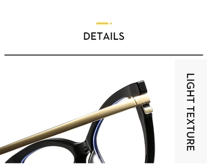 Close-up of cat-eye glasses frame featuring black acetate and gold metal hinges