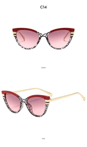 Detailed front and side views of cat-eye sunglasses with red and textured frames