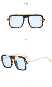 Close-up of square tortoiseshell sunglasses with light blue lenses and gold metal accents