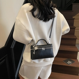 Black ostrich pattern box bag with silver zippers and key pendant for women's crossbody wear