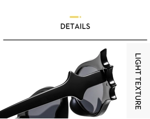 Macro shot of stylish wave-shaped temple hinge on black cat-eye bat sunglasses