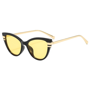 Classic cat-eye sunglasses with thick black frames, yellow lenses and gold metal temples