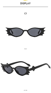 Detail of bat-wing shaped sunglasses with black frames and 45-degree side view
