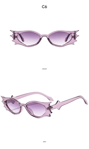 Detail view of purple bat-wing sunglasses with C6 violet gradient lenses from front and side