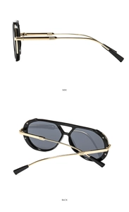 Detail view of double bridge aviator sunglasses with gold metal temples and side textures