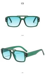 Vue détaillée de lunettes de soleil pilote vertes avec double pont et verres dégradés