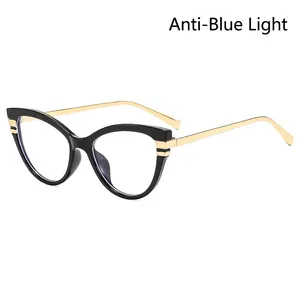 Women's cat eye blue light blocking glasses with black frames and gold metal temples