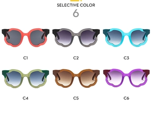 Selective color chart showing six oversized cat-eye sunglasses with wavy frame details