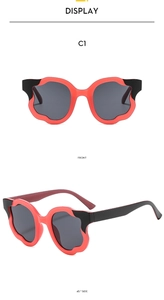 Detail view of flower-shaped two-tone frames from front and 45-degree side angles