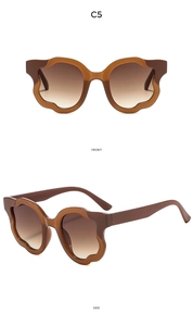 Detail view of wavy tortoise brown frame sunglasses with gradient lenses in C5 colorway
