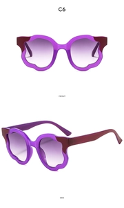 Detailed front and side views of purple wave frame sunglasses with gradient lenses