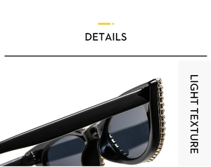 Détail de lunettes œil de chat avec monture noire et ornements en perles de cristal doré