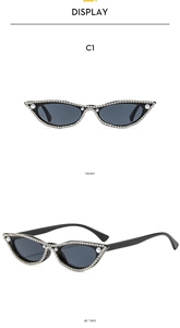 Vue avant et latérale de lunettes de soleil œil de chat avec perles et strass