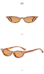 Vues de face et de profil de lunettes de soleil œil de chat écaillées avec perles