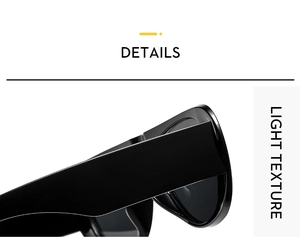 Close-up of black acetate oval sunglasses frame showing high gloss texture and lens detail