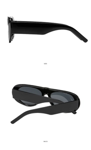 Side and back view of sleek black oval sunglasses showing wide temples and frame thickness