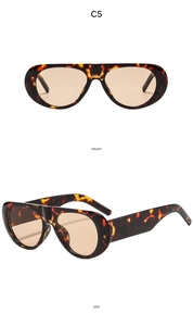 Front and side views of vintage tortoiseshell oval sunglasses with light brown lenses