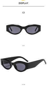 Front and side view of vintage black small cat-eye sunglasses with dark grey lenses