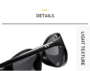 Detailed close-up of cat eye sunglasses with silver rivet accents on high-gloss black frame