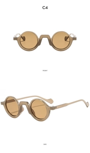 Vorder- und Seitenansicht der runden Vintage-Sonnenbrille in Braun mit transparentem Rahmen