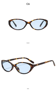 Retro cat-eye sunglasses with tortoise shell frame and blue lenses from front and side view