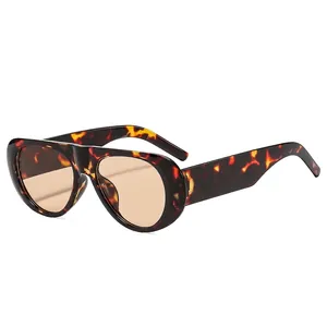 Classic tortoise shell oval sunglasses with brown tinted lenses and wide temples