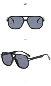 Close-up of black square aviator sunglasses with double bridge and silver hinge details