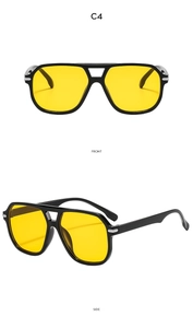 Retro pilot sunglasses featuring double bridge black frames and vibrant yellow lenses