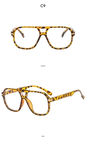 Detail view of tortoiseshell aviator sunglasses with silver metal accents on front and side