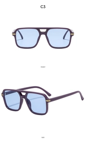 Vue détaillée des lunettes de soleil violettes à double pont avec verres bleus