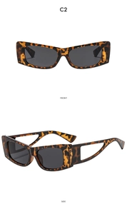 Detail view of tortoiseshell cat-eye sunglasses with unique hollowed geometric temples
