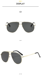 Front and 45-degree side views of gold aviator sunglasses with gray polarized lenses