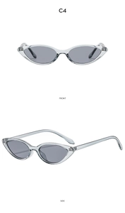 Front and side views of vintage cat eye sunglasses with transparent gray frames